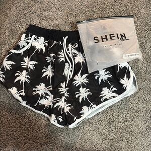 SHEIN Black and White Athletic Shorts with Palm Tree Design